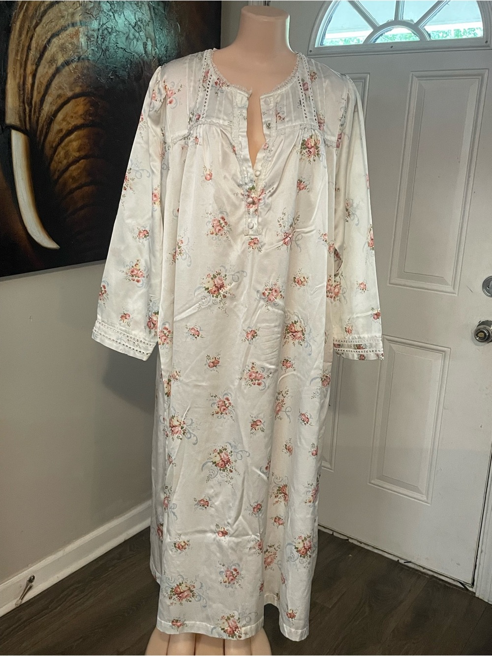 vintage ivory satin long-sleeve nightgown featuring a delicate pink floral print